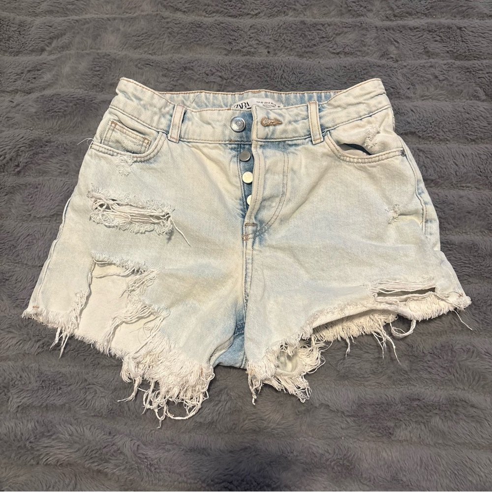 High-Rise Distressed Light Wash Denim Shorts